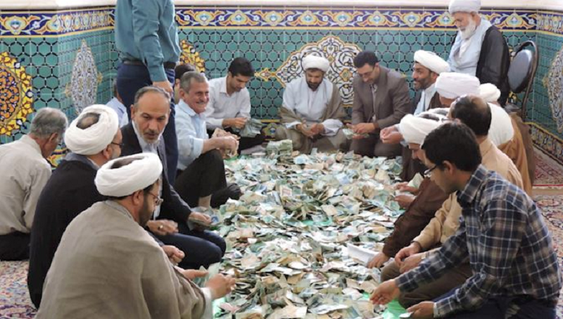 Iran’s authorities and their relatives line their pockets with the people’s charities in a shrine