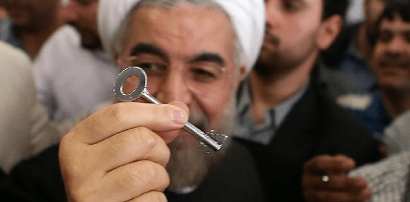 Iran regime’s President Hassan Rouhani holding the symbolic all ‘problems solving key’