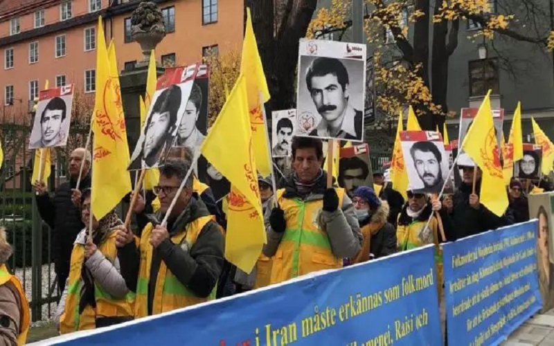 Iranians, supporters of the MEK and the NCRI demonstrate in Stockholm, Sweden, concurrent with Hamid Nouri's trial who is one of the perpetrators of the 1988 Massacre.