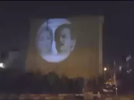 Large image of the leadership of Iran’s Resistance is projected on a wall at the intersection of East Iranshahr-Kourosh street.
