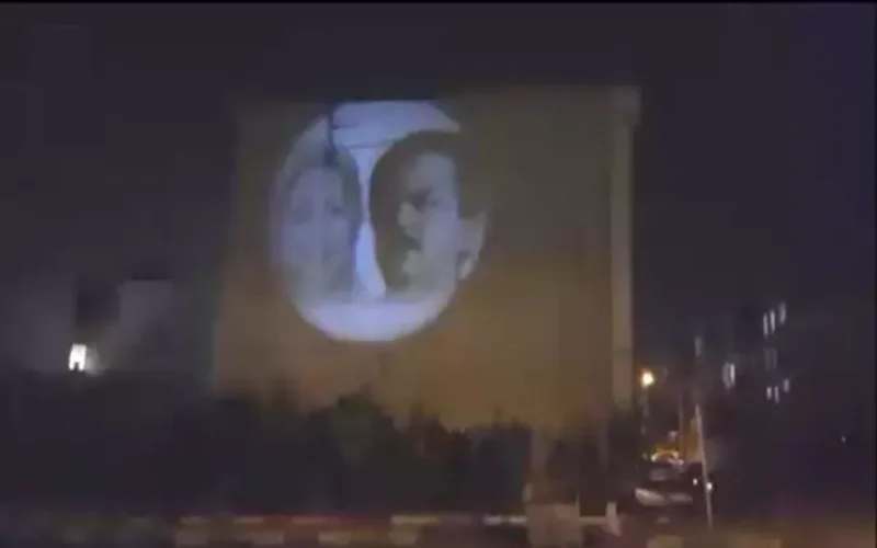 Large image of the leadership of Iran’s Resistance is projected on a wall at the intersection of East Iranshahr-Kourosh street.