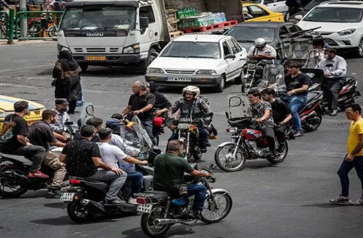 When Millions Deliver Packages Instead of Building an Economy: Iran's Motorcycle Courier Boom Is a Poverty Story